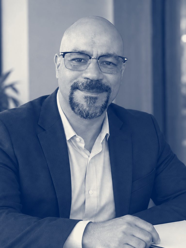 Thomas Potter at a conference table